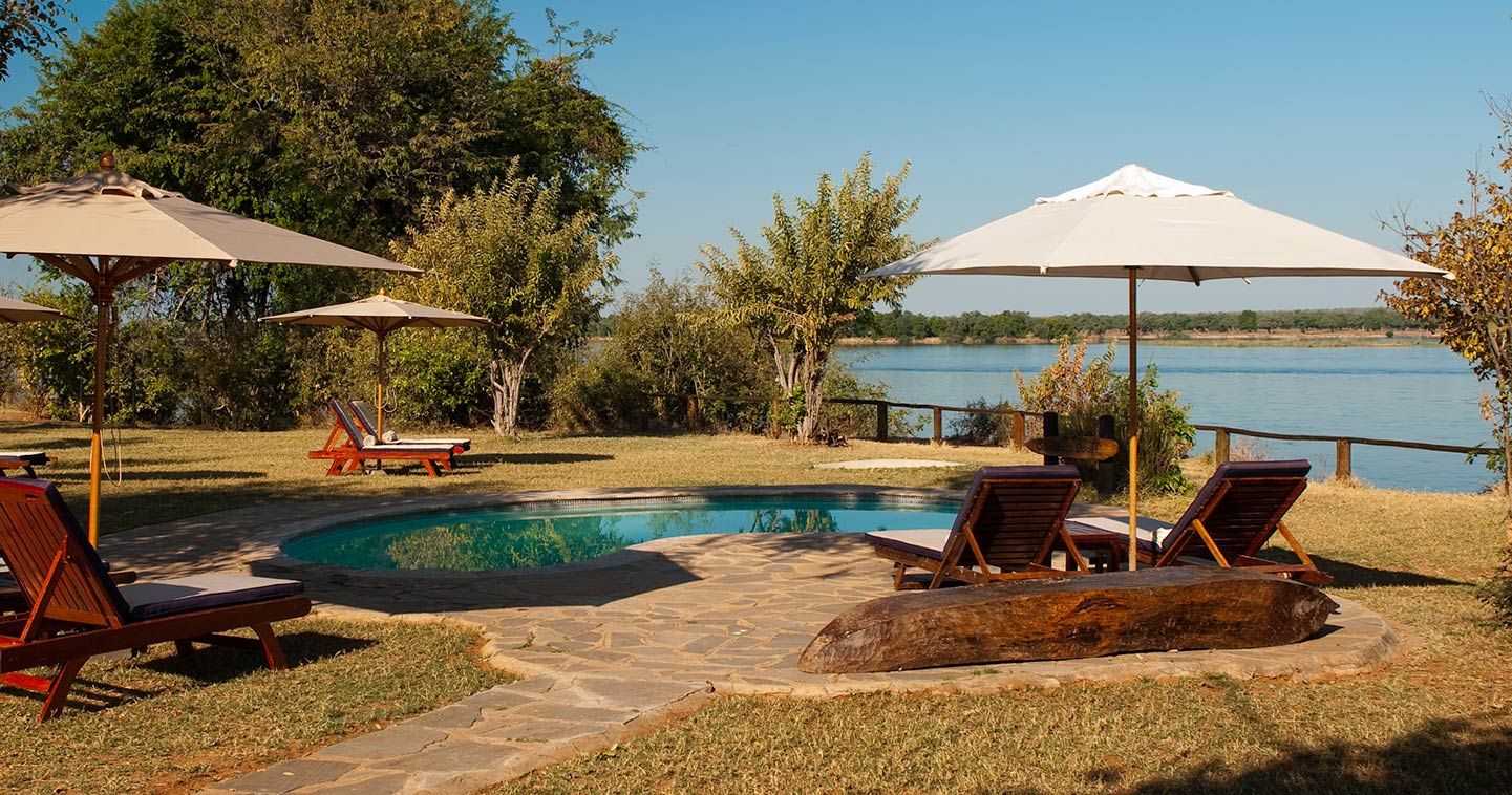 Pool Next to the Zambezi River at Kasaka River Lodge
